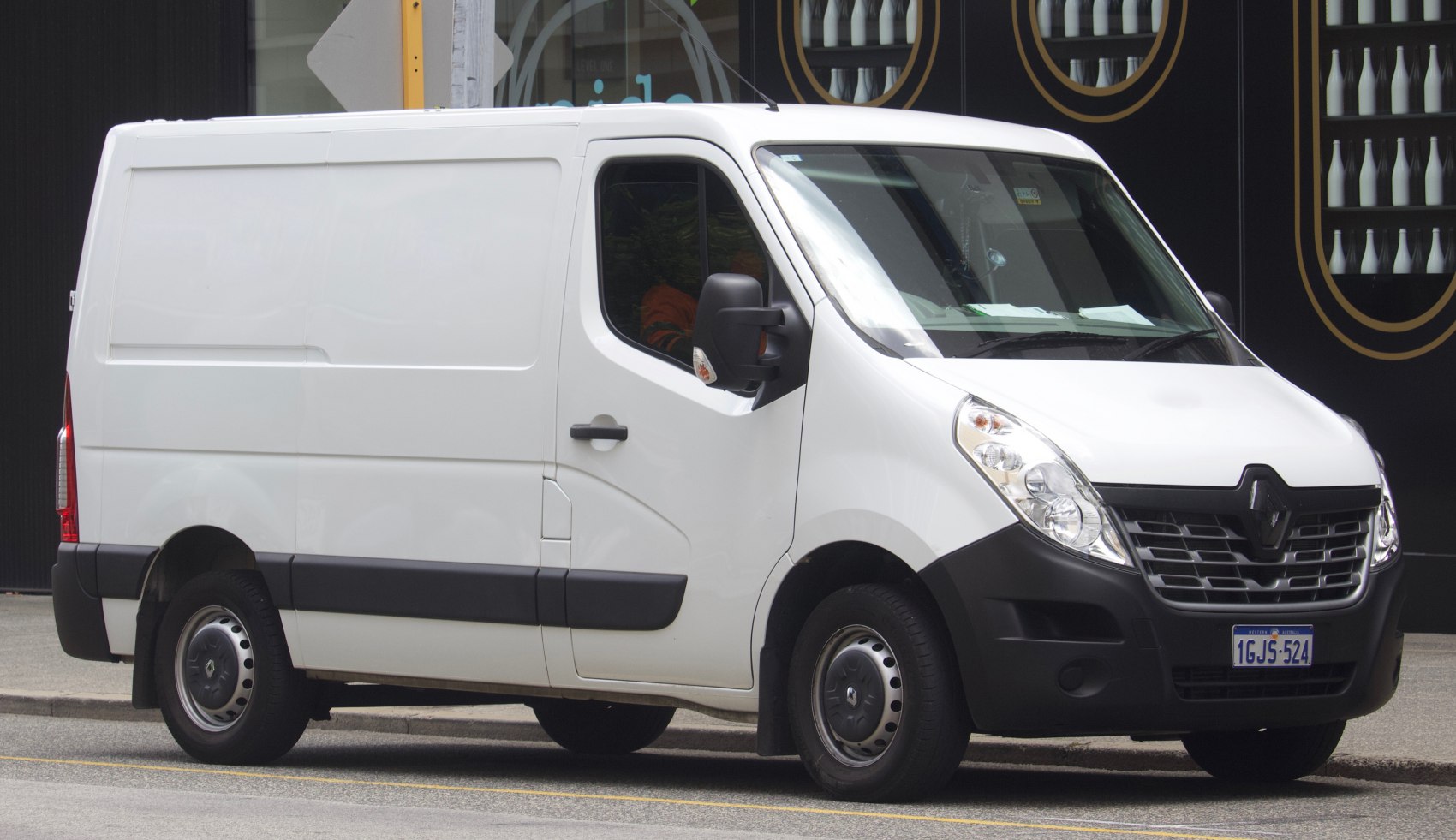 White panel van with black trim, side and front profile, steel wheels