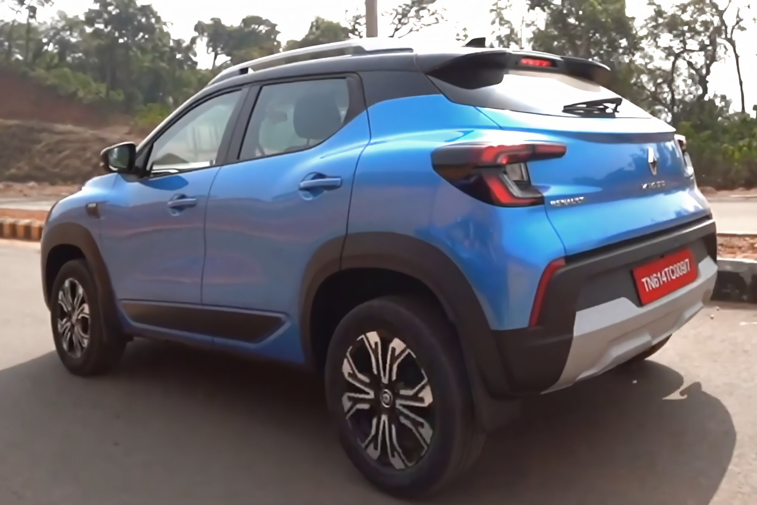 Compact SUV rear side with modern alloy wheels and taillights
