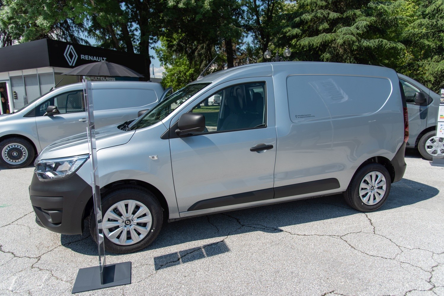 Silver van side profile with black trim and modern wheel covers