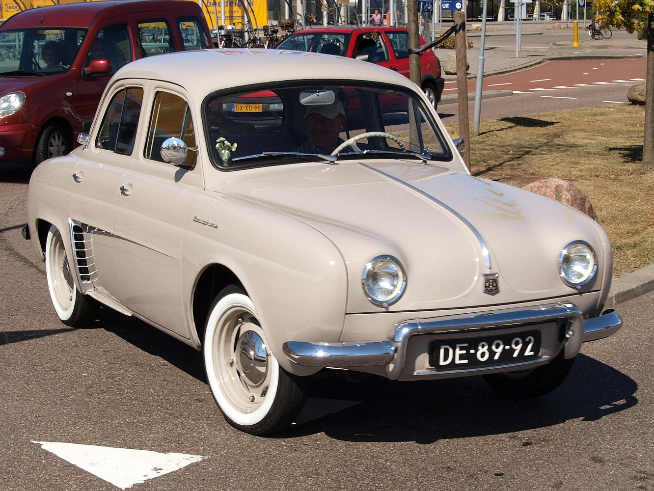 Classic vintage sedan with round headlights and chrome bumper