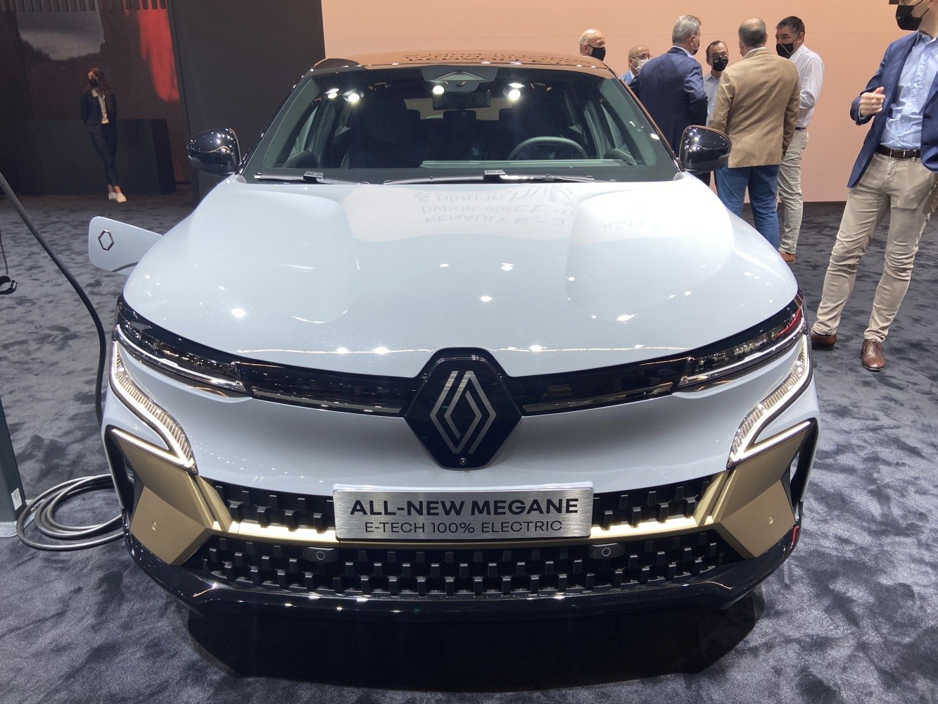 Front view with sleek headlights and modern grille of electric hatchback
