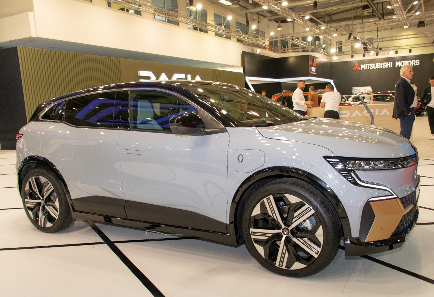 Sleek electric crossover with distinctive wheels and sharp LED front lighting
