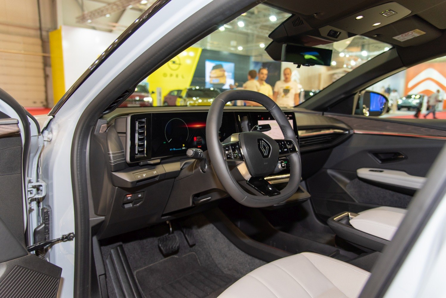 Digital dashboard and advanced steering wheel controls inside electric vehicle