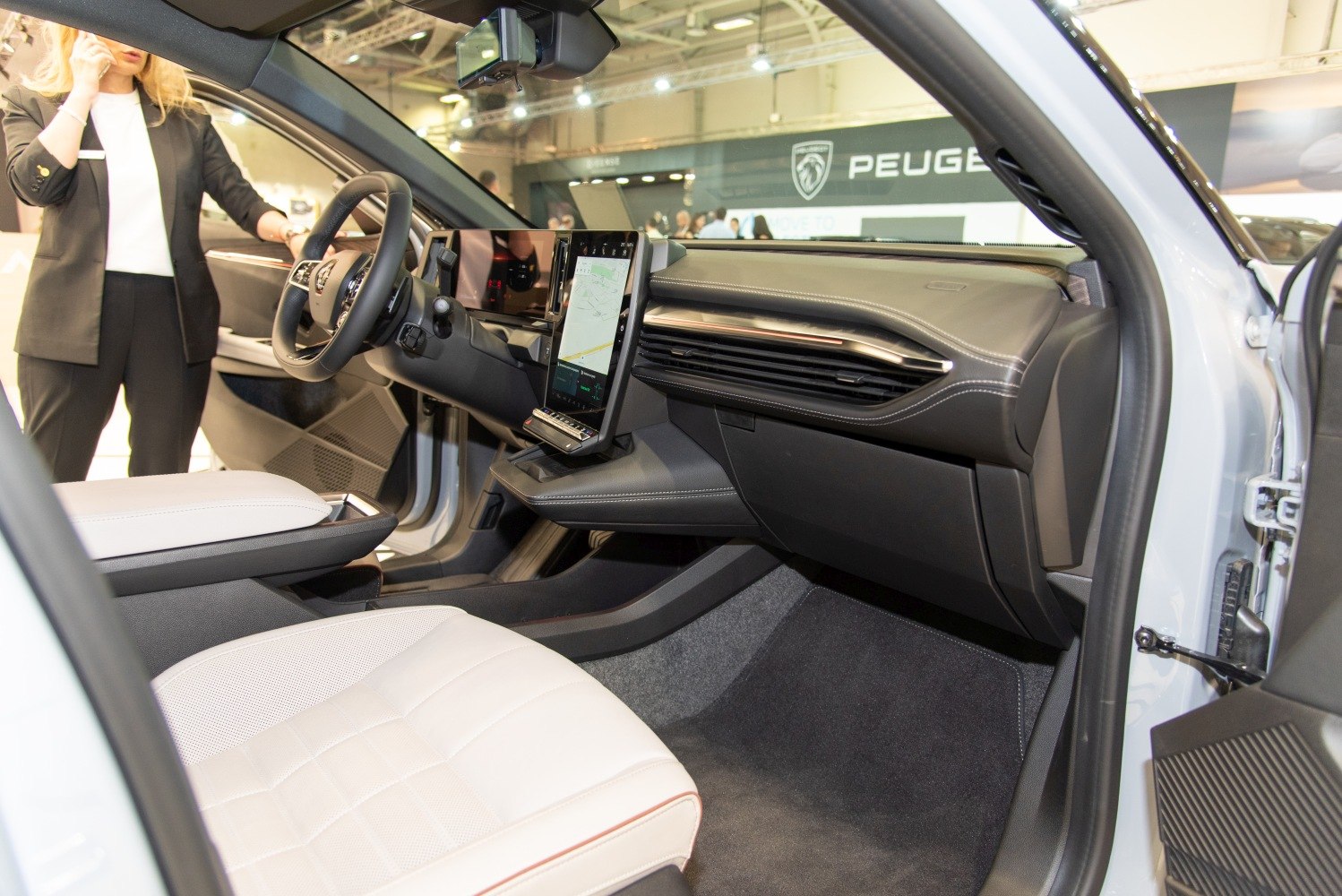 Modern car interior with digital dashboard and vertical touchscreen