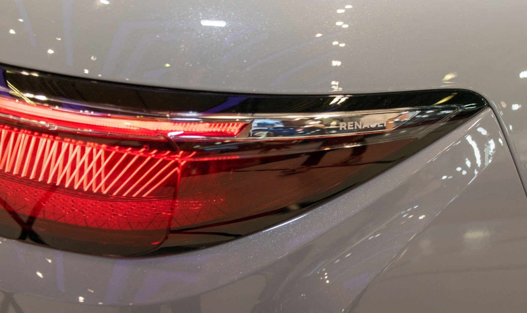 Close-up of a modern car rear taillight with sleek design and LED elements