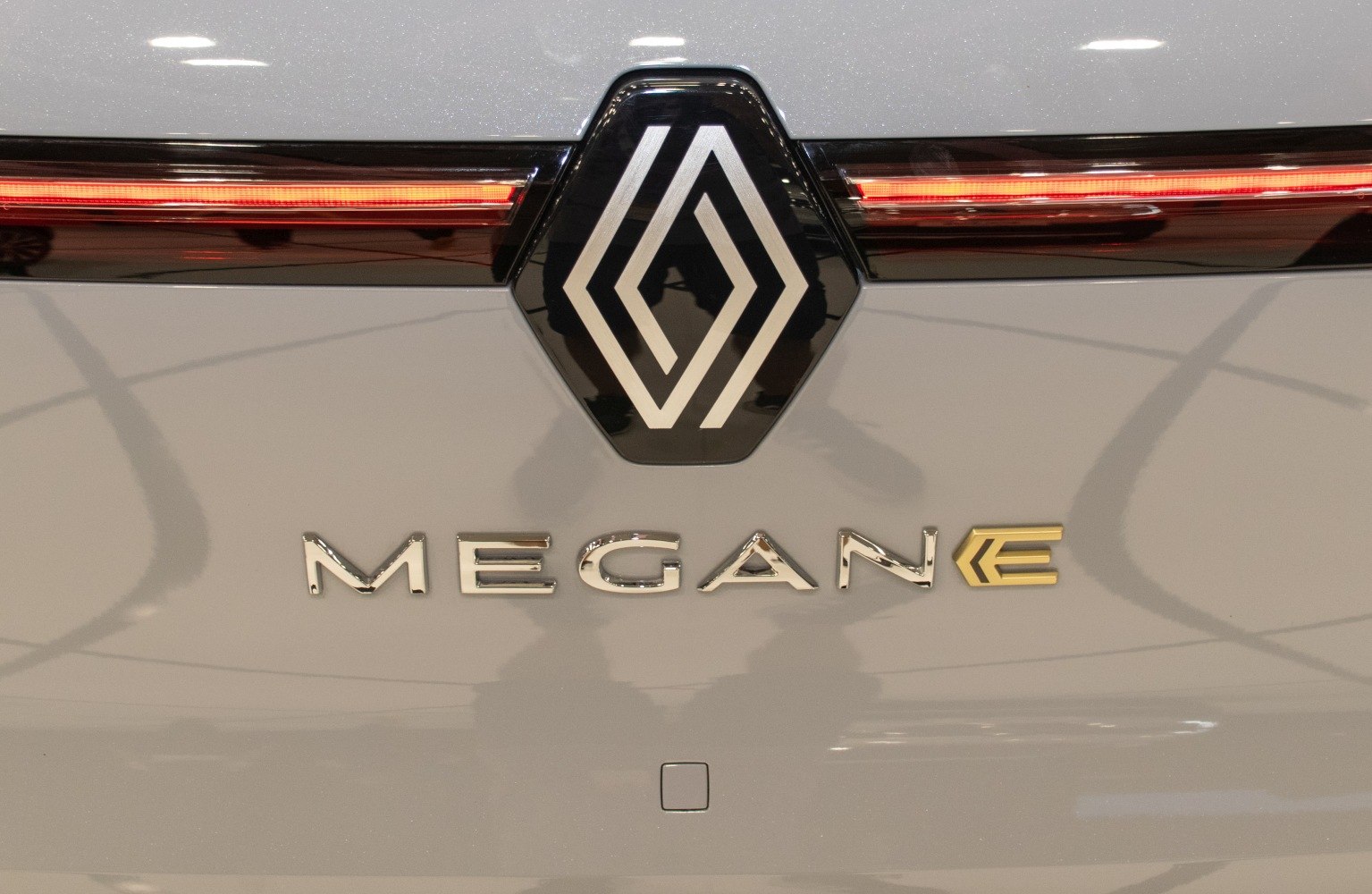 Close-up of rear badge and horizontal tail light strip