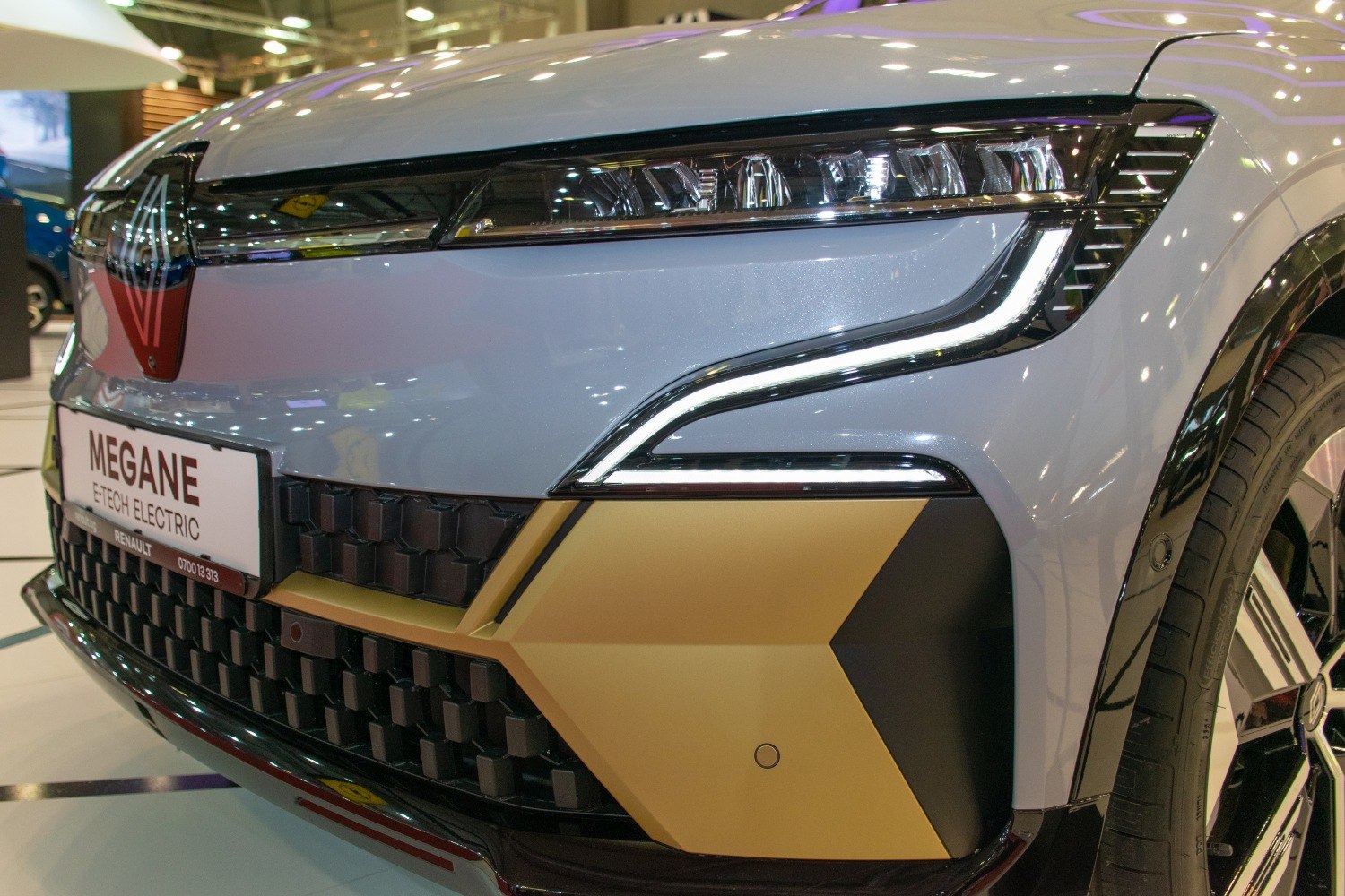 Close-up of LED headlight and front grille design