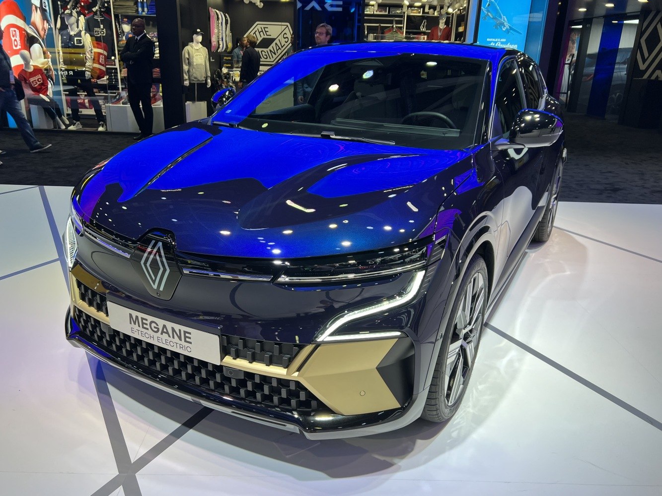Front view with distinct LED headlights and modern grille design