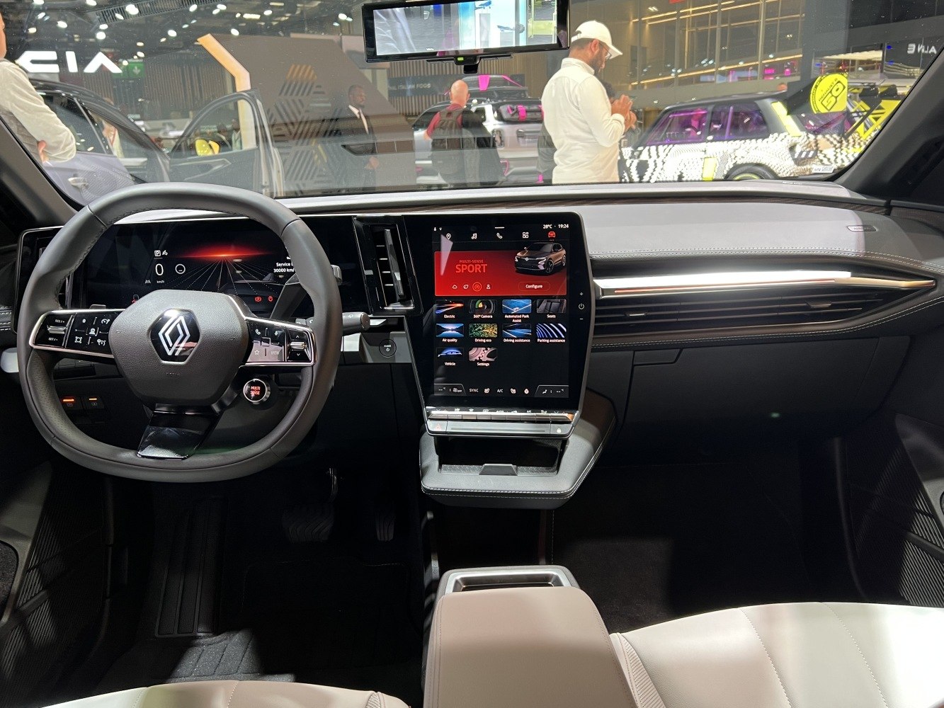 Digital dashboard and vertical touchscreen infotainment in electric vehicle interior