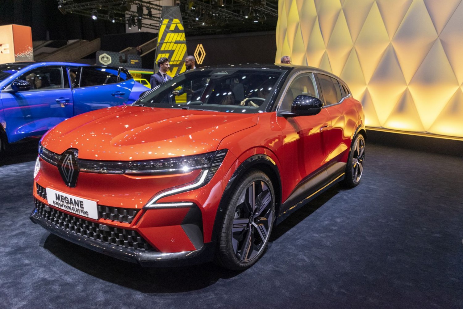 Front and side view of compact electric SUV with modern grille design