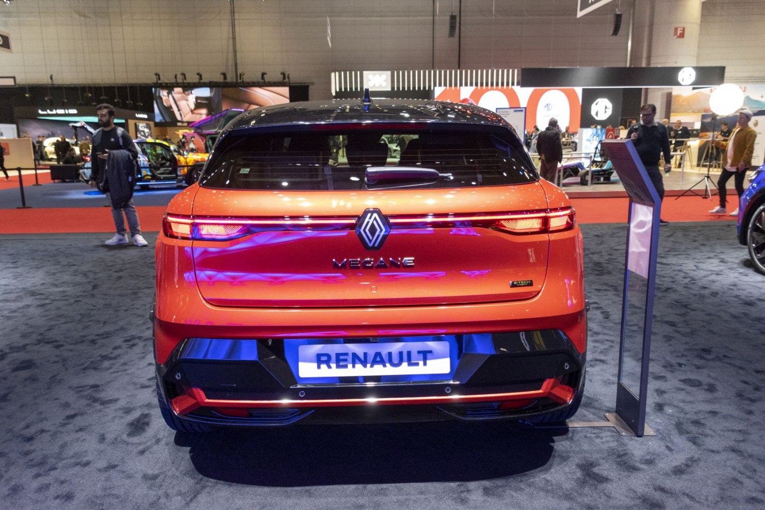 Rear view of modern electric hatchback with continuous taillight bar and E-Tech badge