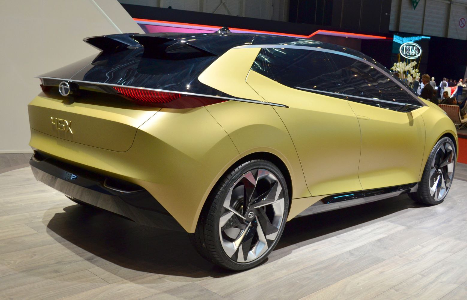 Sleek rear hatch with futuristic taillights and striking alloy wheels.
