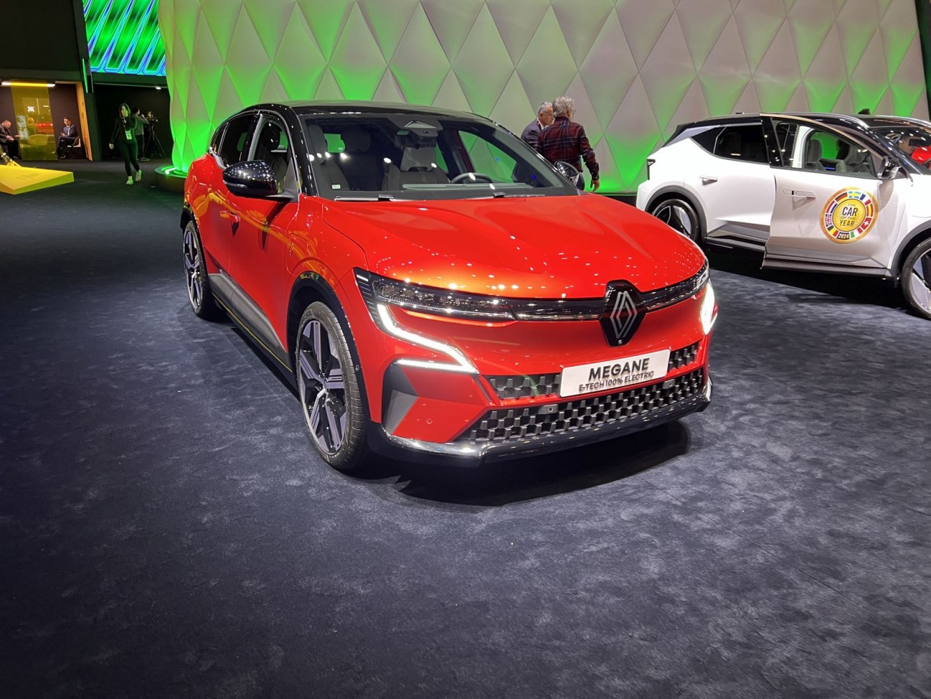 Front view of red electric vehicle with LED lights