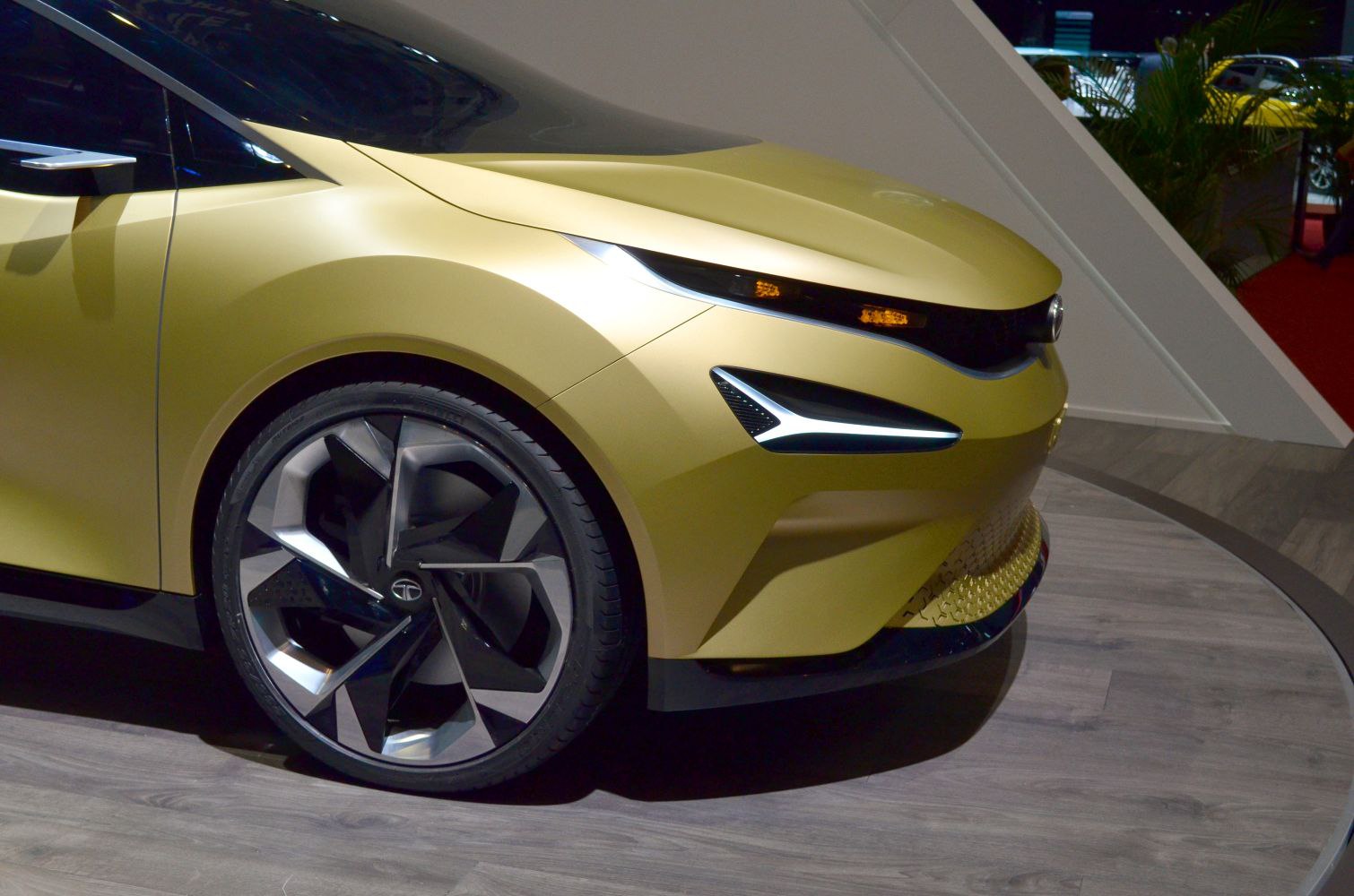 Sleek front side design with LED headlights and alloy wheels.