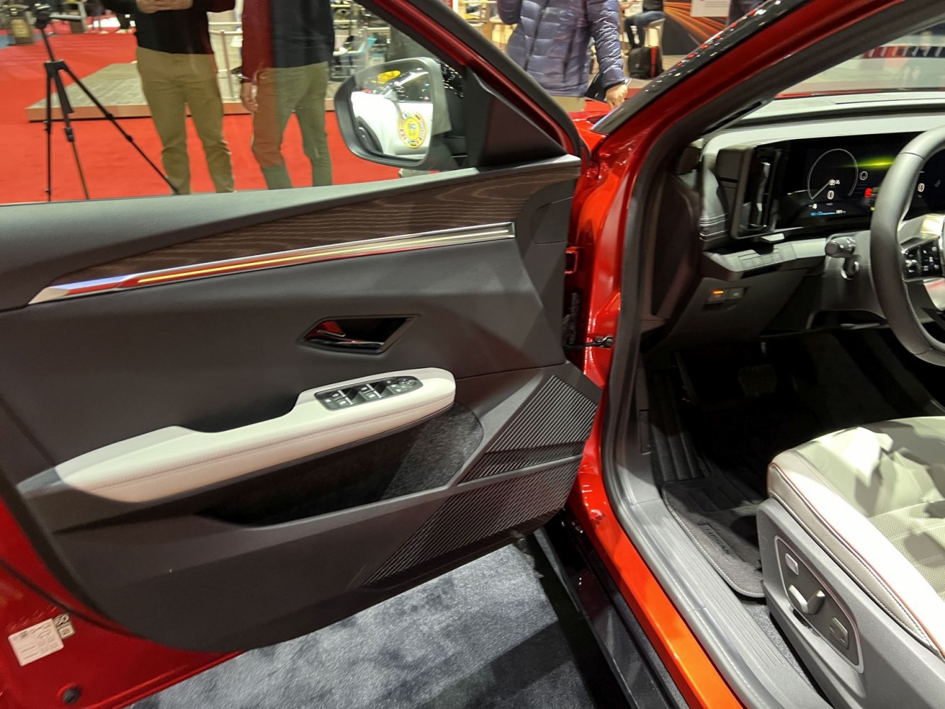 Interior door panel with controls and digital dashboard view
