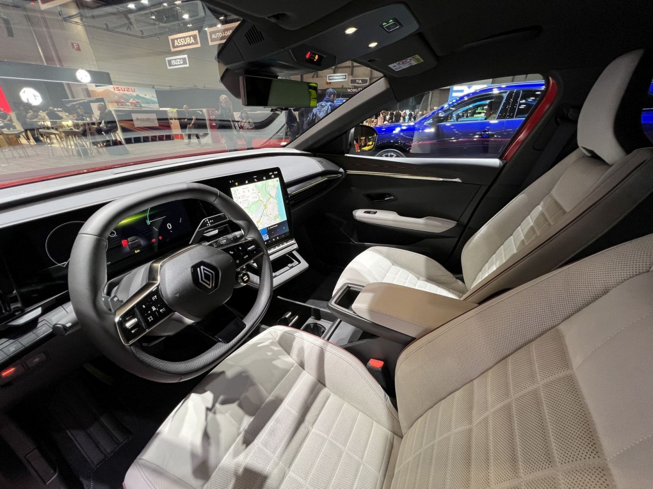 Modern electric vehicle interior with digital dashboard and premium seats
