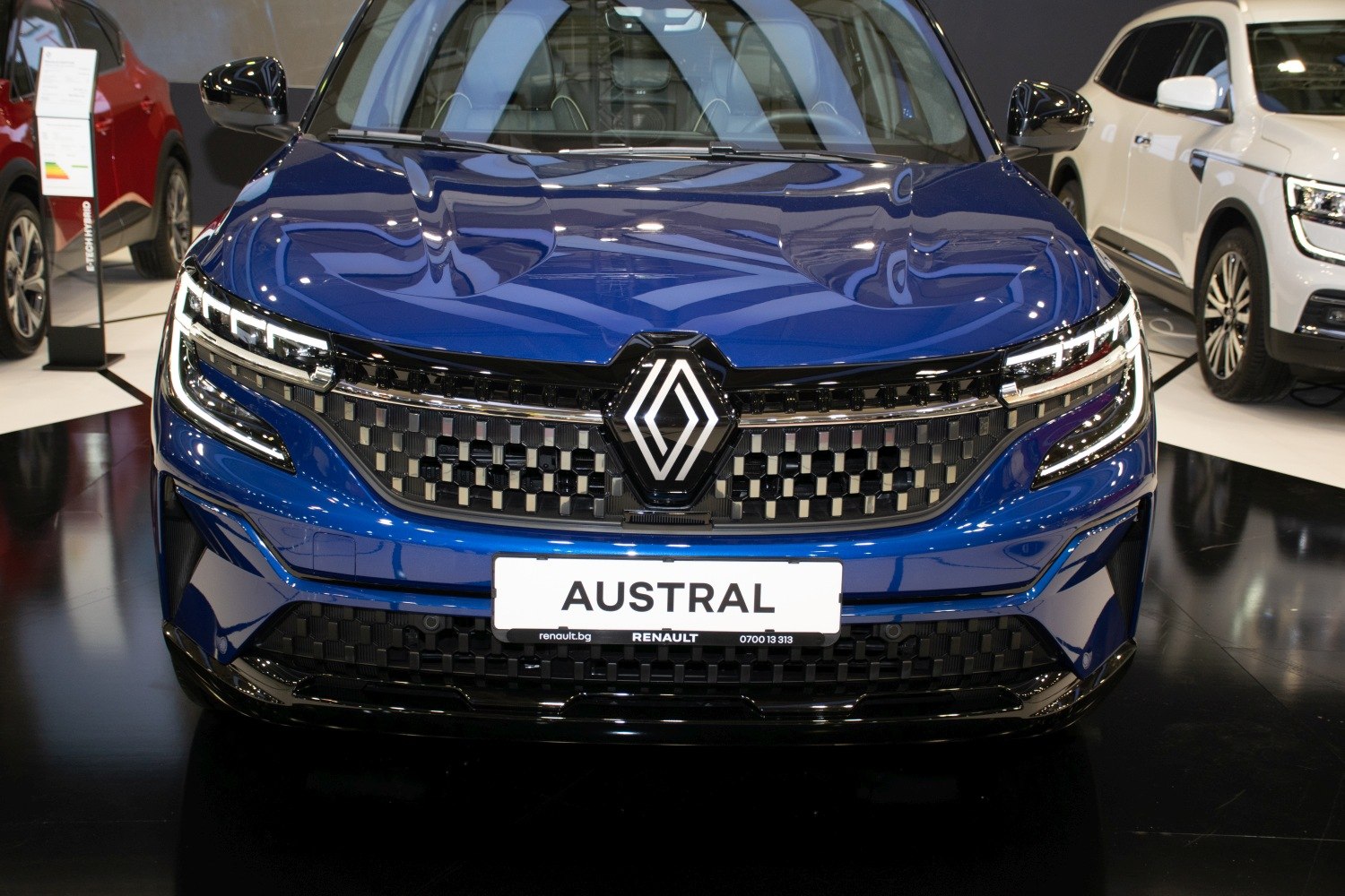 Front view with LED headlights and distinctive grille