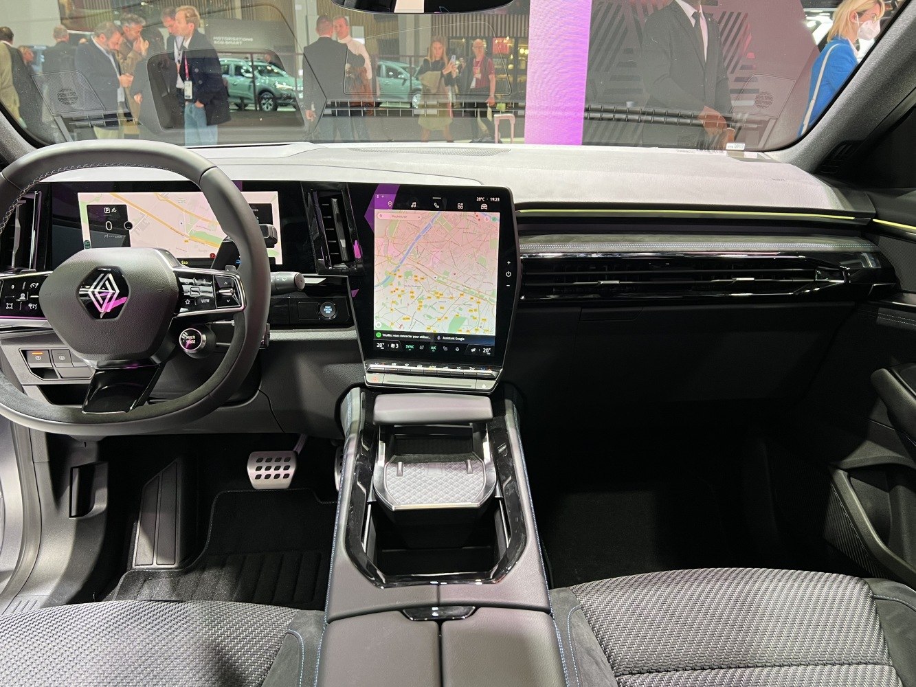 Digital dashboard and central touchscreen display in modern car interior