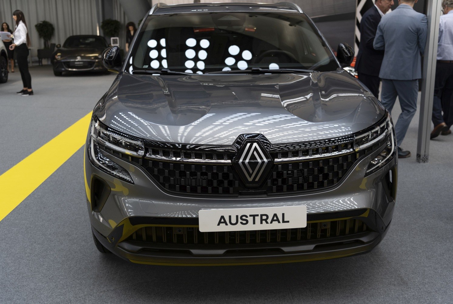Front fascia with grille and LED headlights
