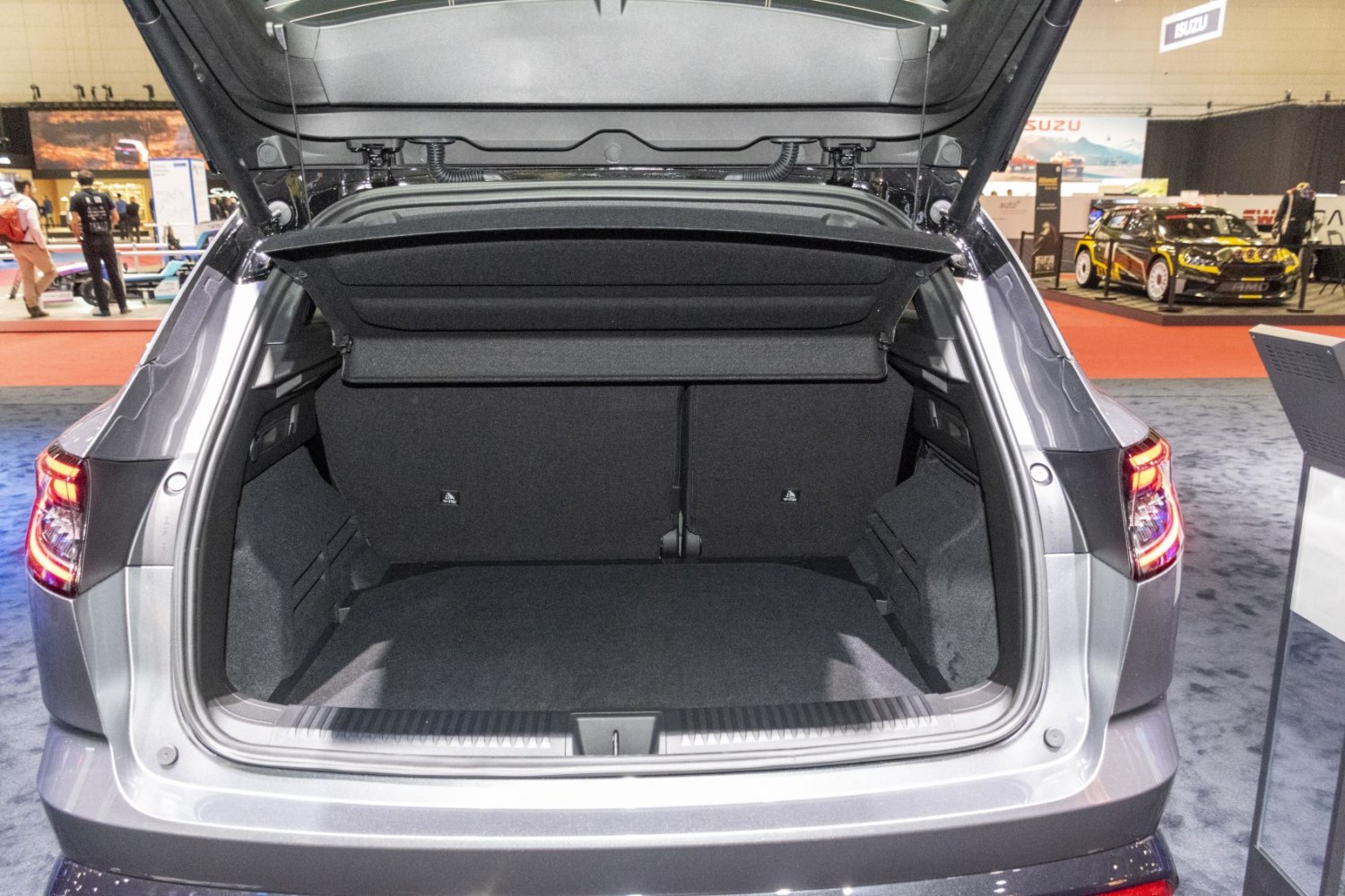 Large and spacious rear trunk cargo area with open hatch.