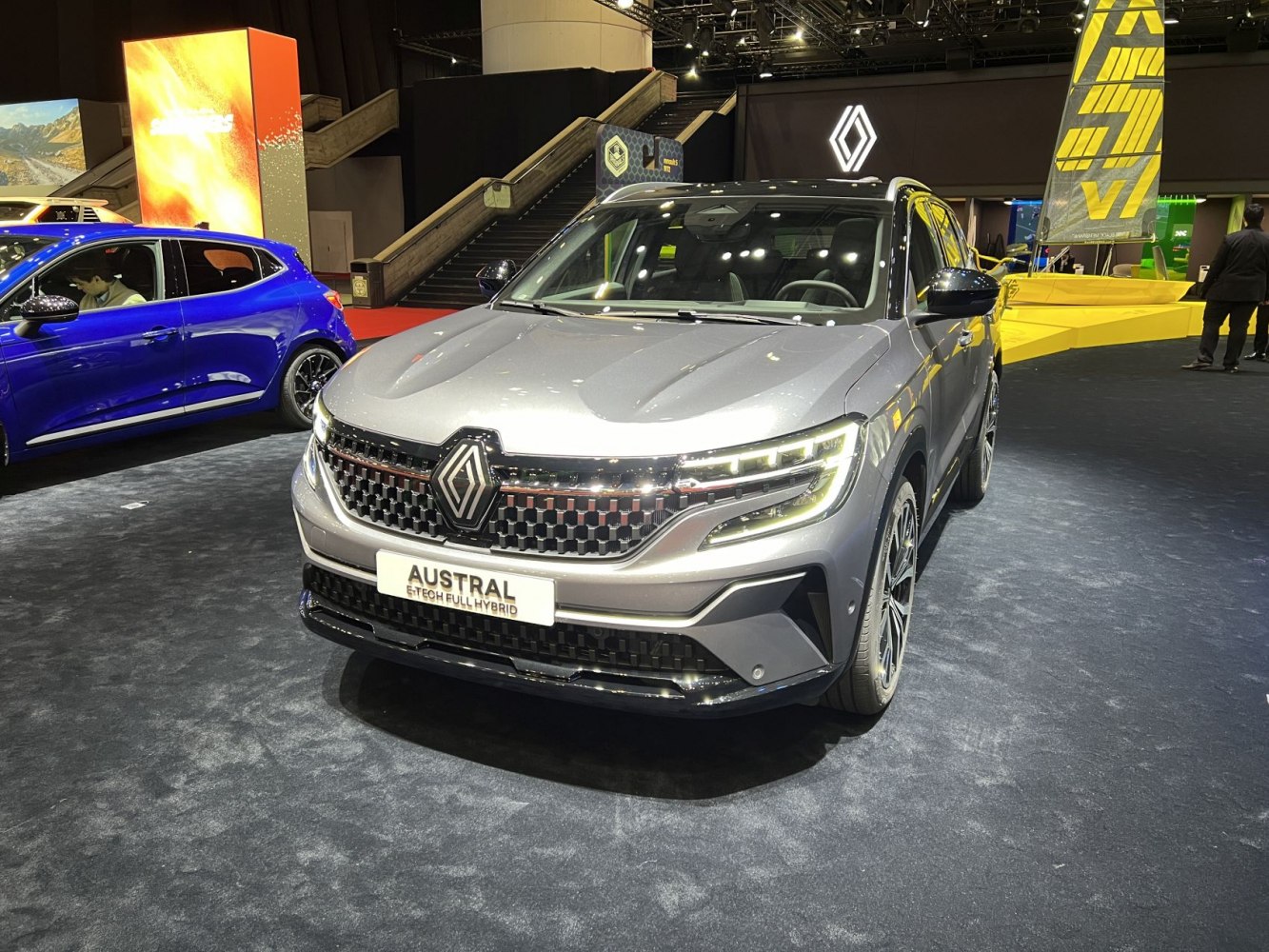 Front view of hybrid SUV with LED headlights and distinctive grille