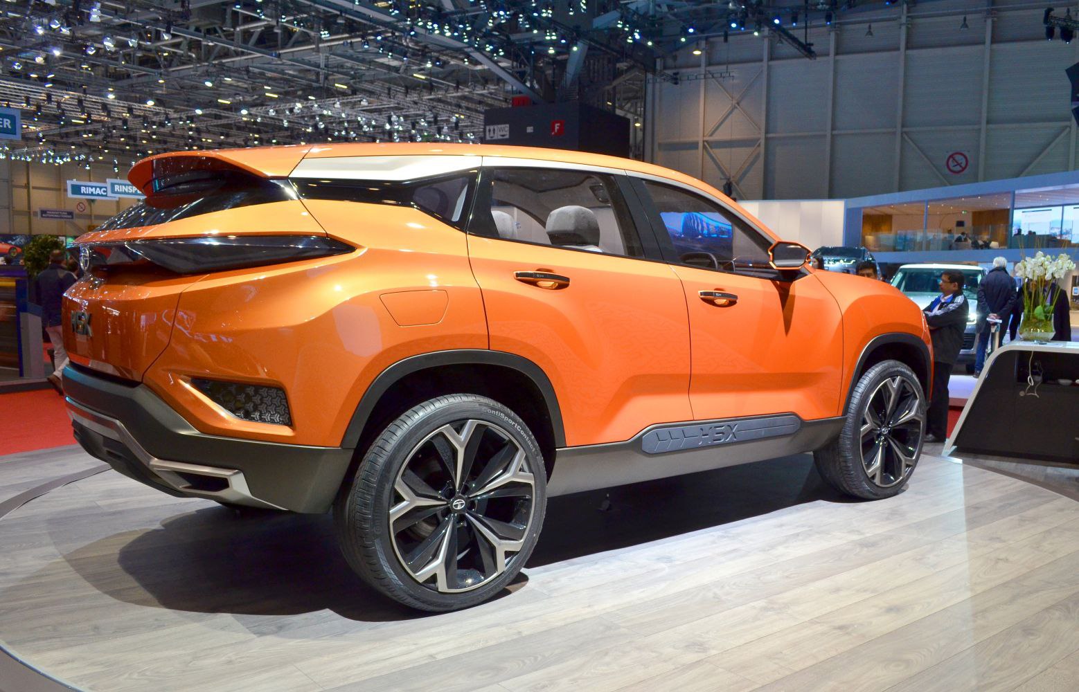 Bold orange SUV with distinctive rear and alloy wheels