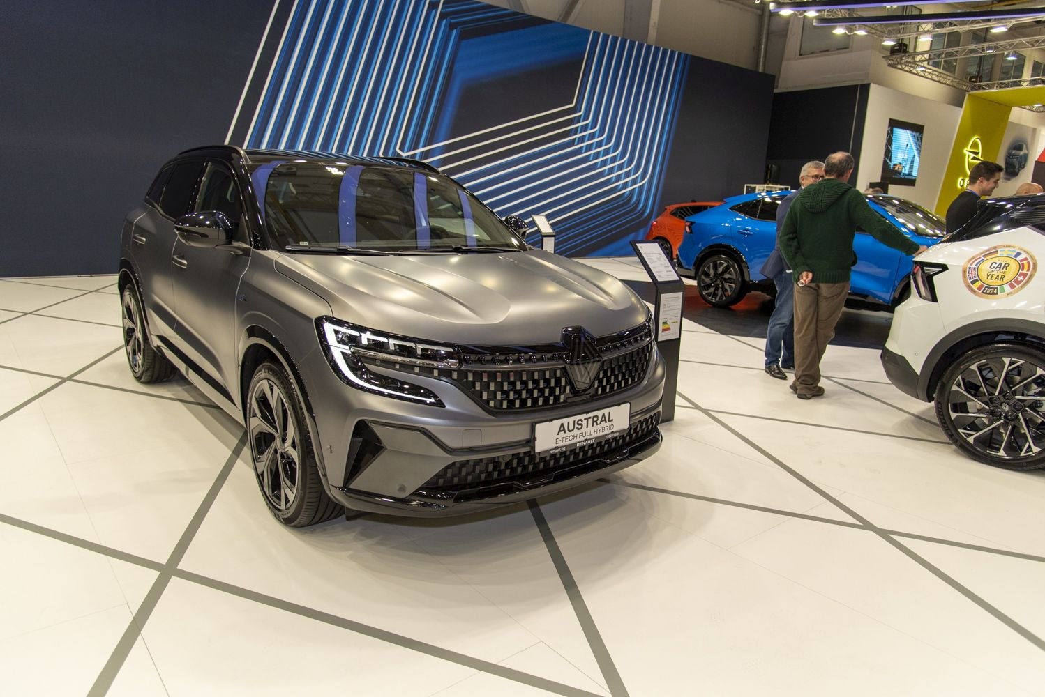 Matte grey SUV front with LED headlights and distinctive grille design