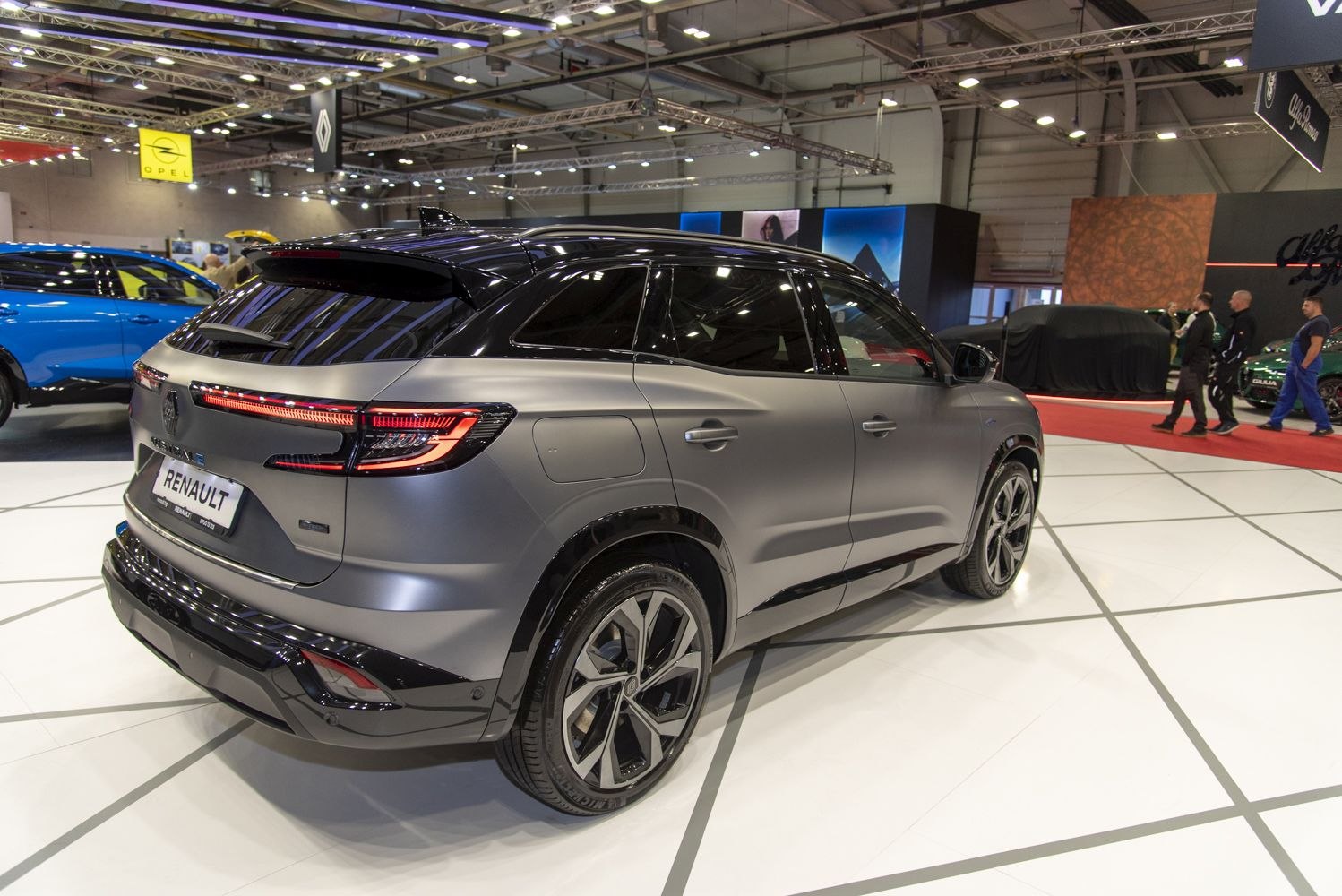 Sleek rear LED tail lights and sporty alloy wheels with black roof and tinted windows.