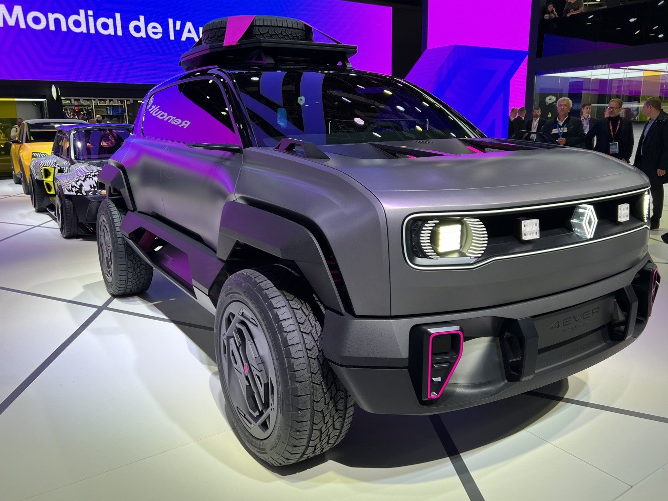 Futuristic electric SUV with bold LED headlights and rugged design