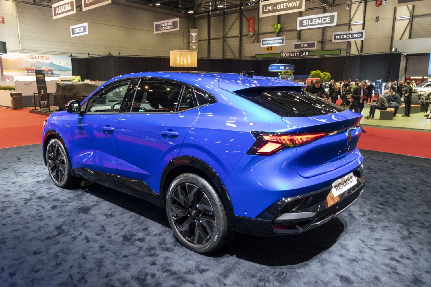 Sporty rear and side profile of a blue SUV with sharp taillights and aerodynamic design