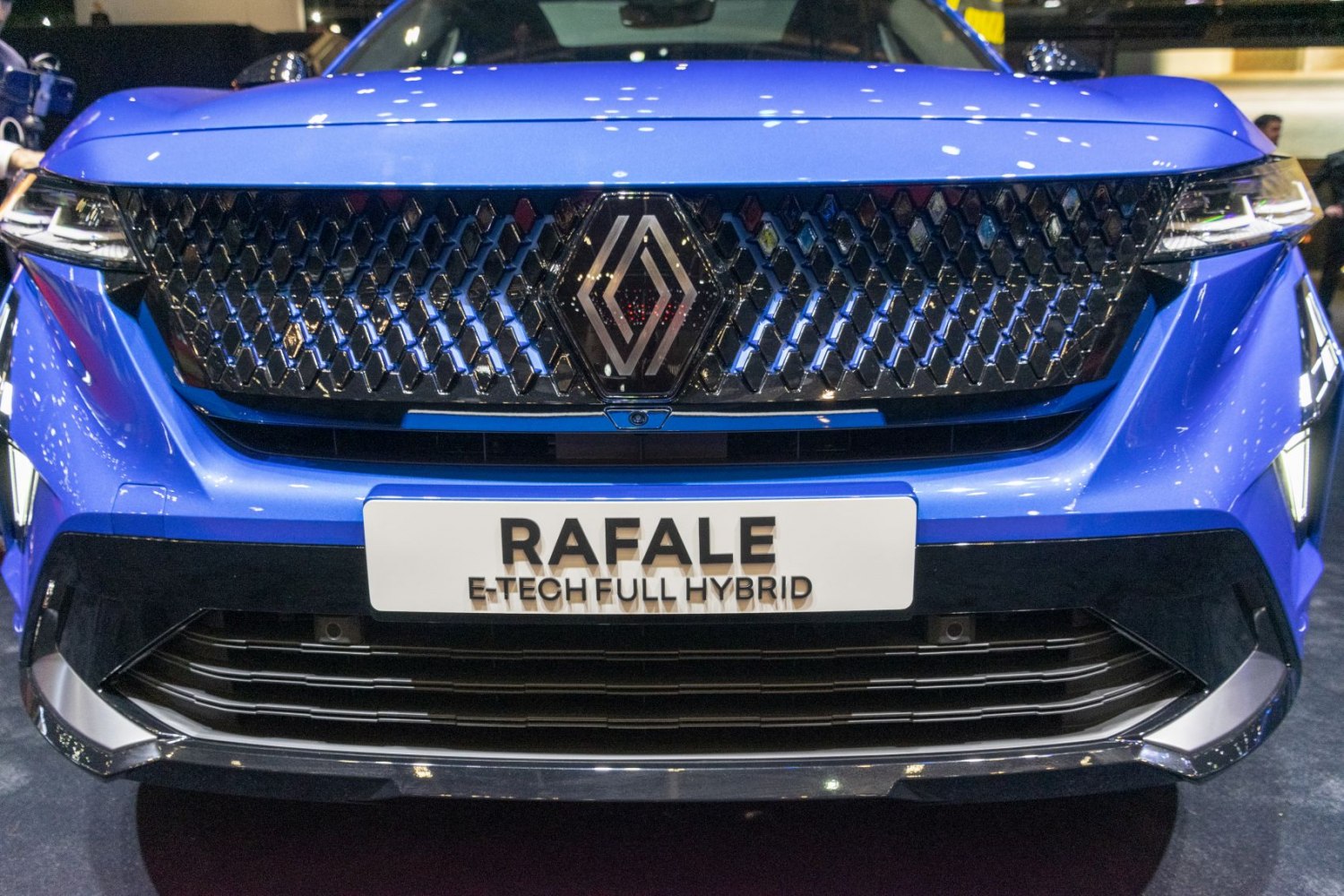 Front grille and LED headlights with hybrid badge