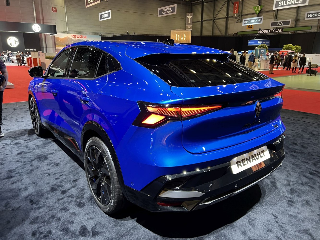 Sporty SUV rear view with sharp LED taillights and vivid blue paint