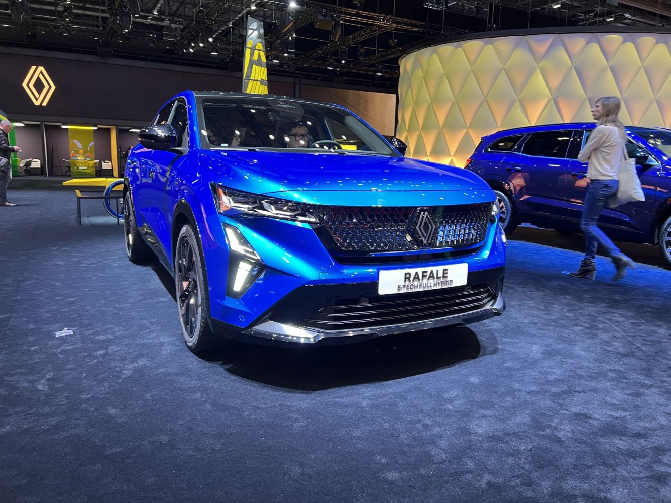 Front view with grille and LED headlights of a sleek hybrid SUV