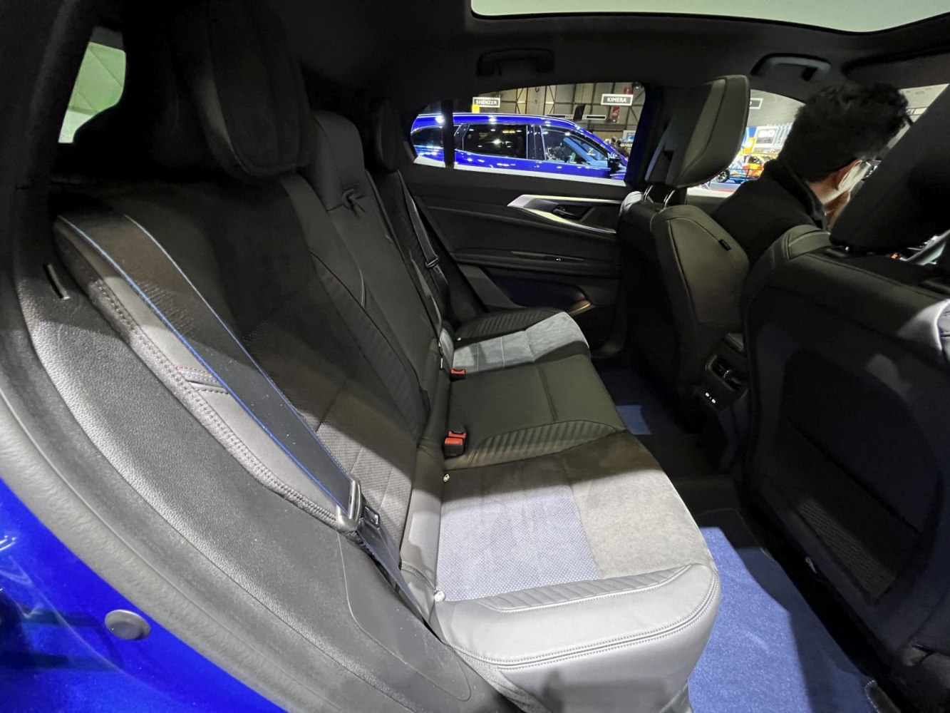 Rear interior with premium mixed-material seats and spacious legroom