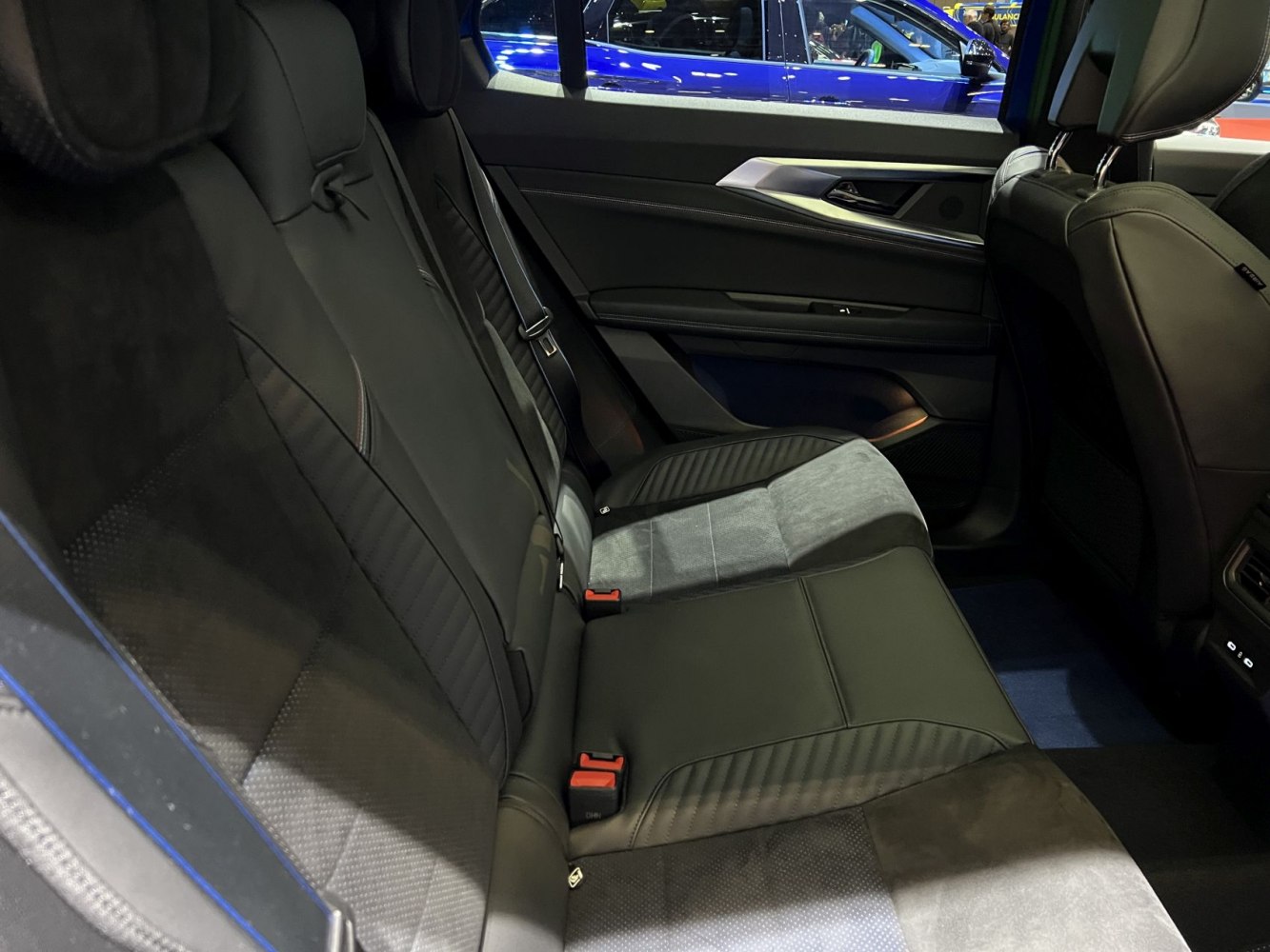 Rear seat interior with detailed upholstery and door panel