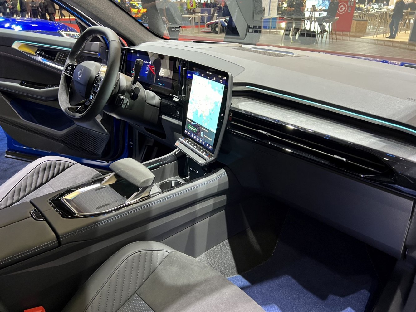 Digital instrument cluster and large vertical touchscreen infotainment system