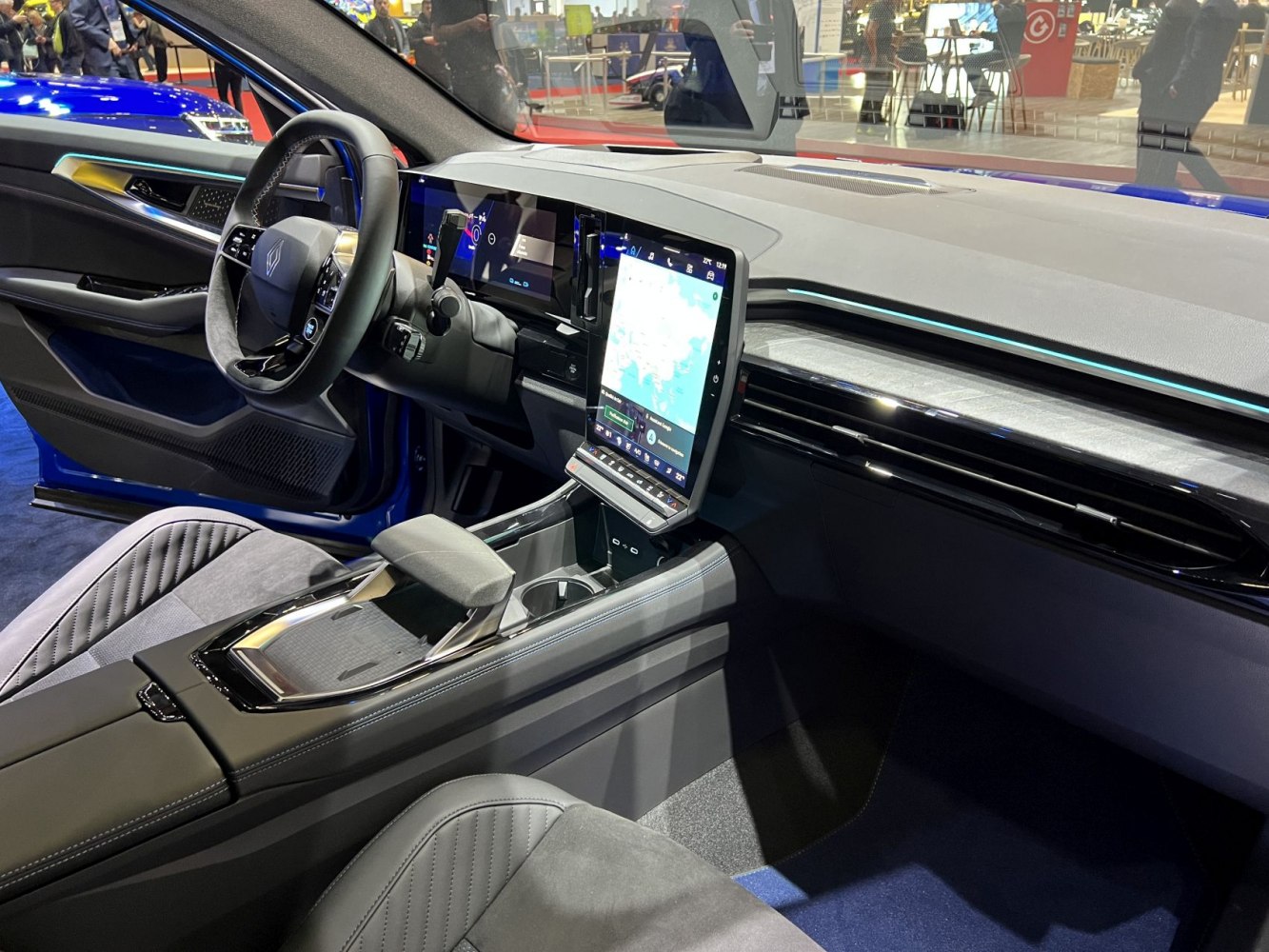 Digital dashboard and large vertical touchscreen in modern car interior