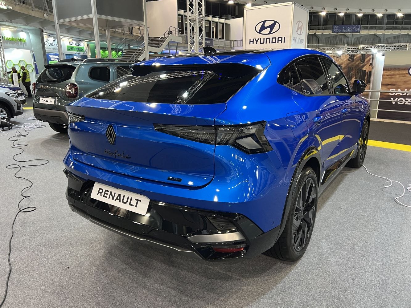 Rear view with sharp tail lights and sporty aerodynamic contours