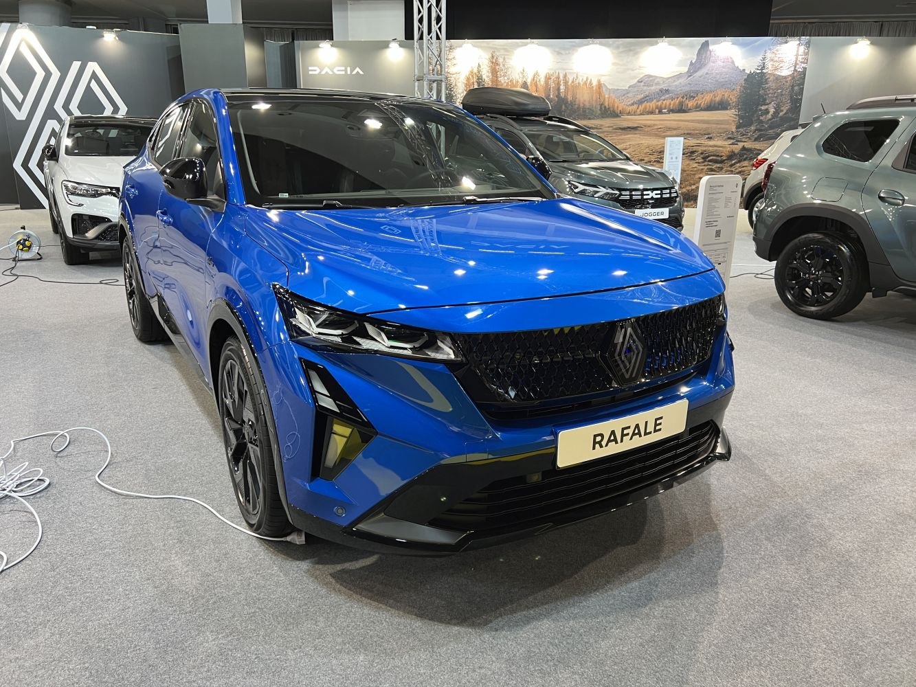 Sporty front grille and LED headlights design in striking blue finish
