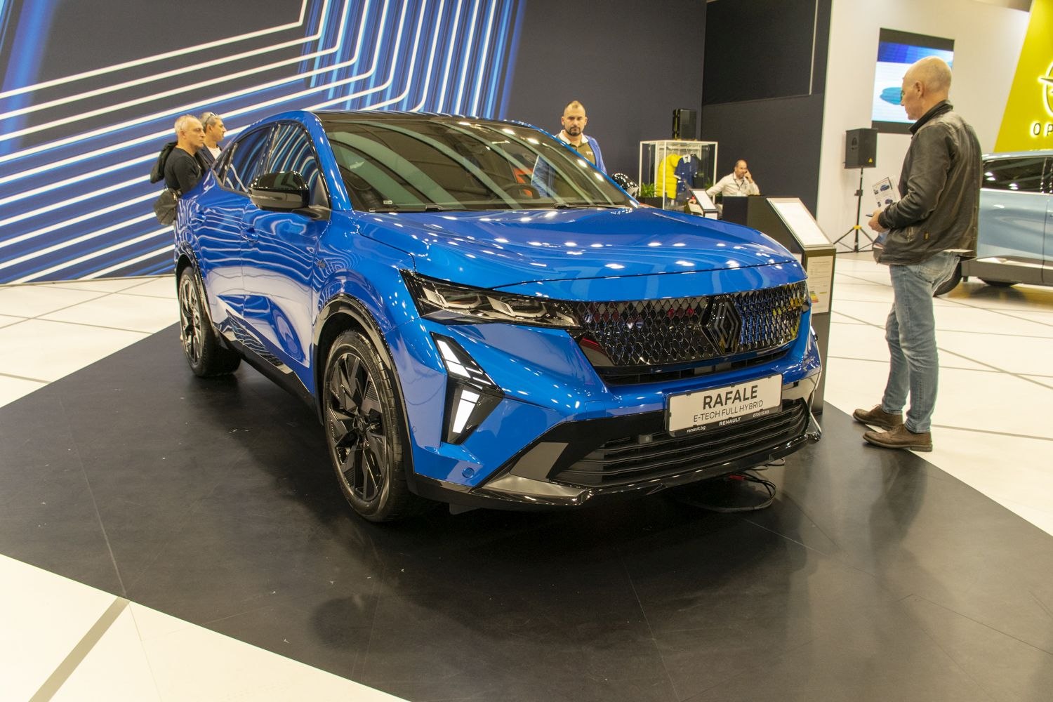 Bold front grille and advanced LED headlights on a modern hybrid vehicle