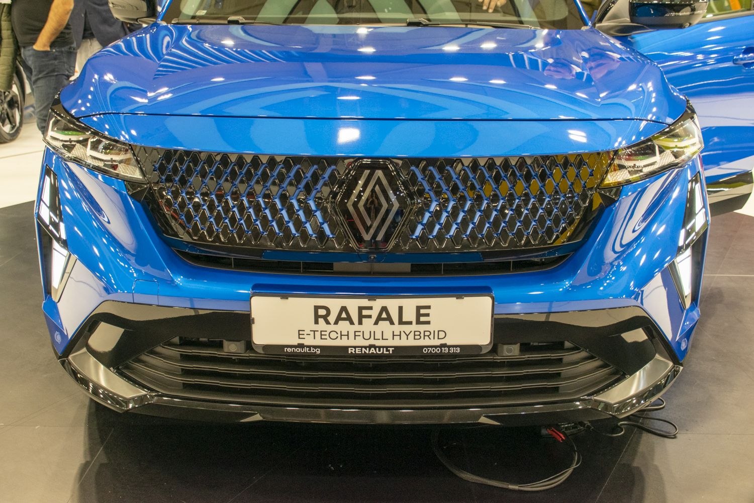 Front grille and LED headlights of a modern hybrid vehicle