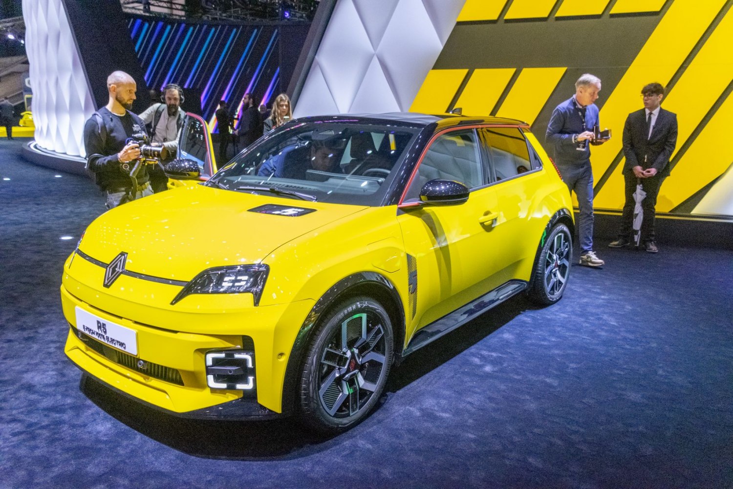 Yellow hatchback with front LED lights and sporty alloy wheels