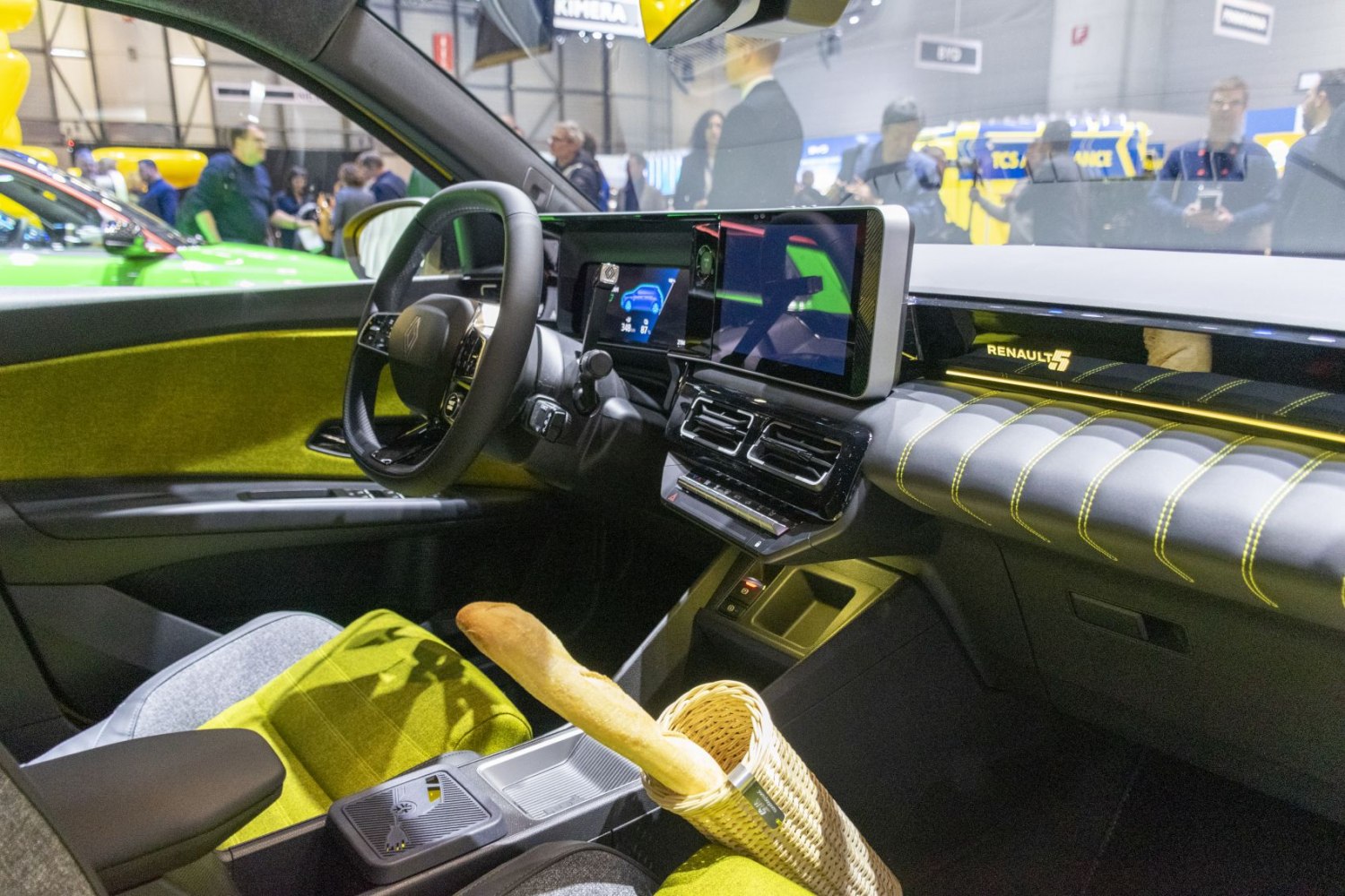 Modern electric car interior with digital dashboard and green-yellow upholstery
