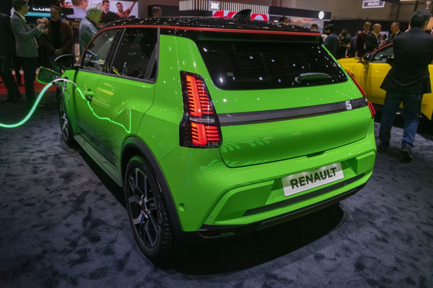 Rear view of electric hatchback with LED taillights and charging cable