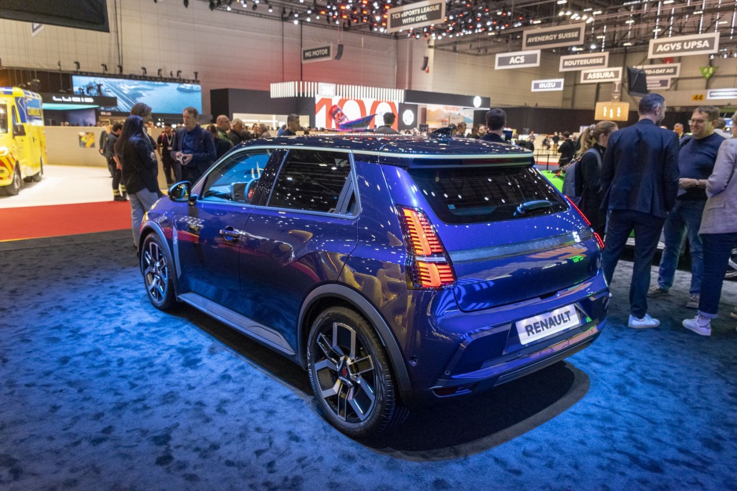 Rear and side view with distinctive taillights and alloy wheels