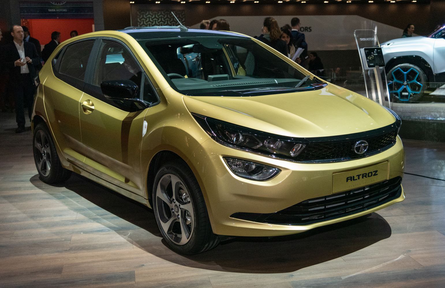 Front side view with sleek headlights and alloy wheels