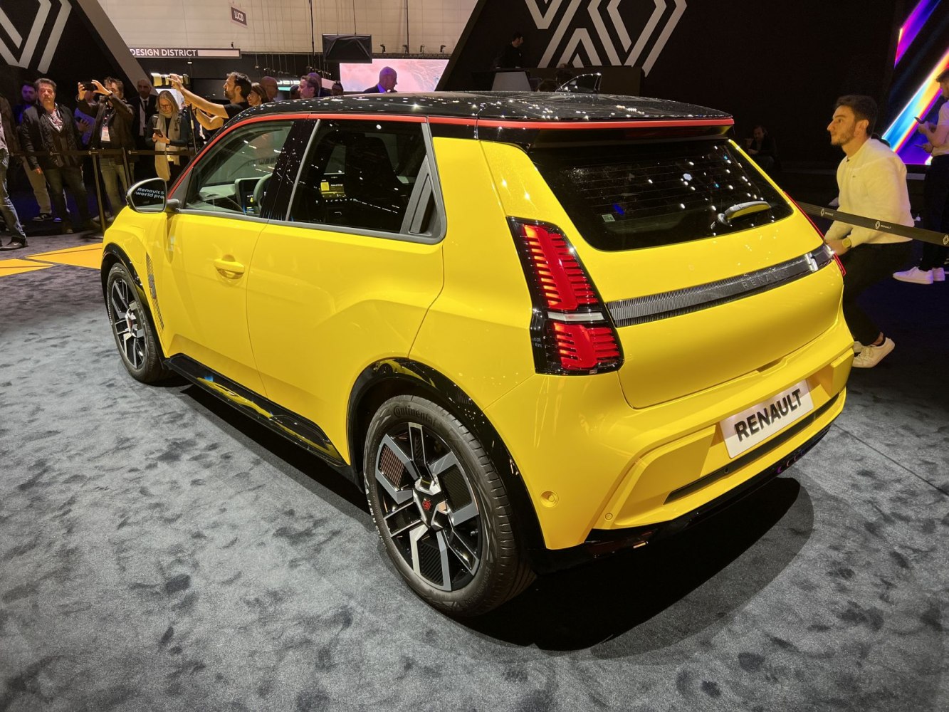 Modern compact electric hatchback rear side view with bold two-tone design
