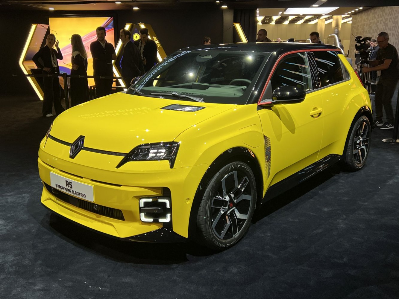 Compact electric vehicle with LED headlights and sporty alloy wheels
