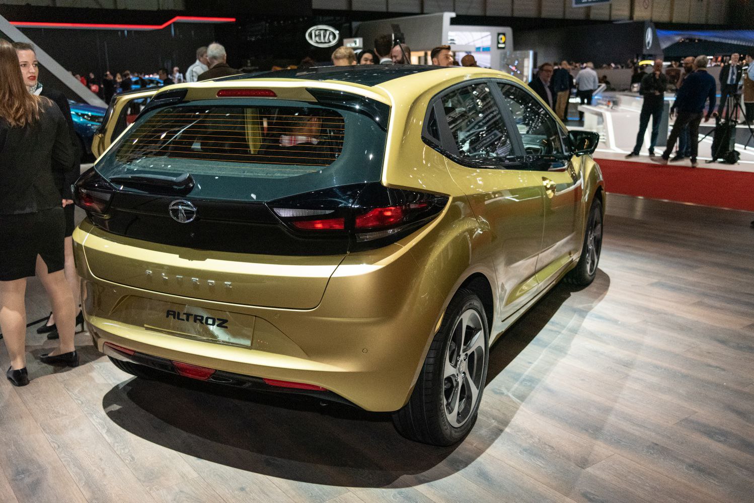 Rear view showing two-tone black and gold finish with sleek tail lights
