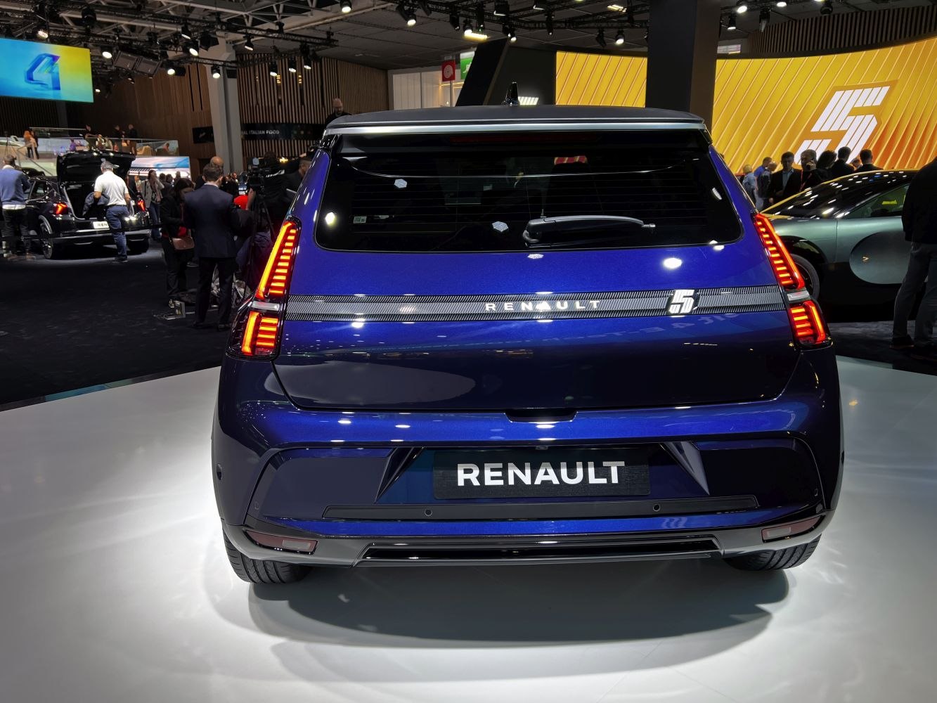 Rear view of a compact hatchback with distinctive LED tail lights.